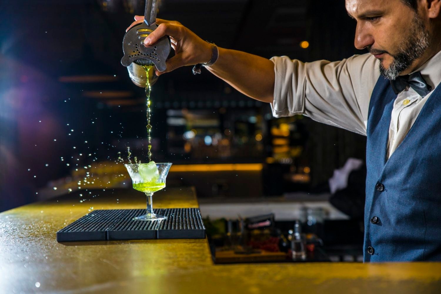 barman-is-making-cocktail-at-night-club-1-e1624968616257